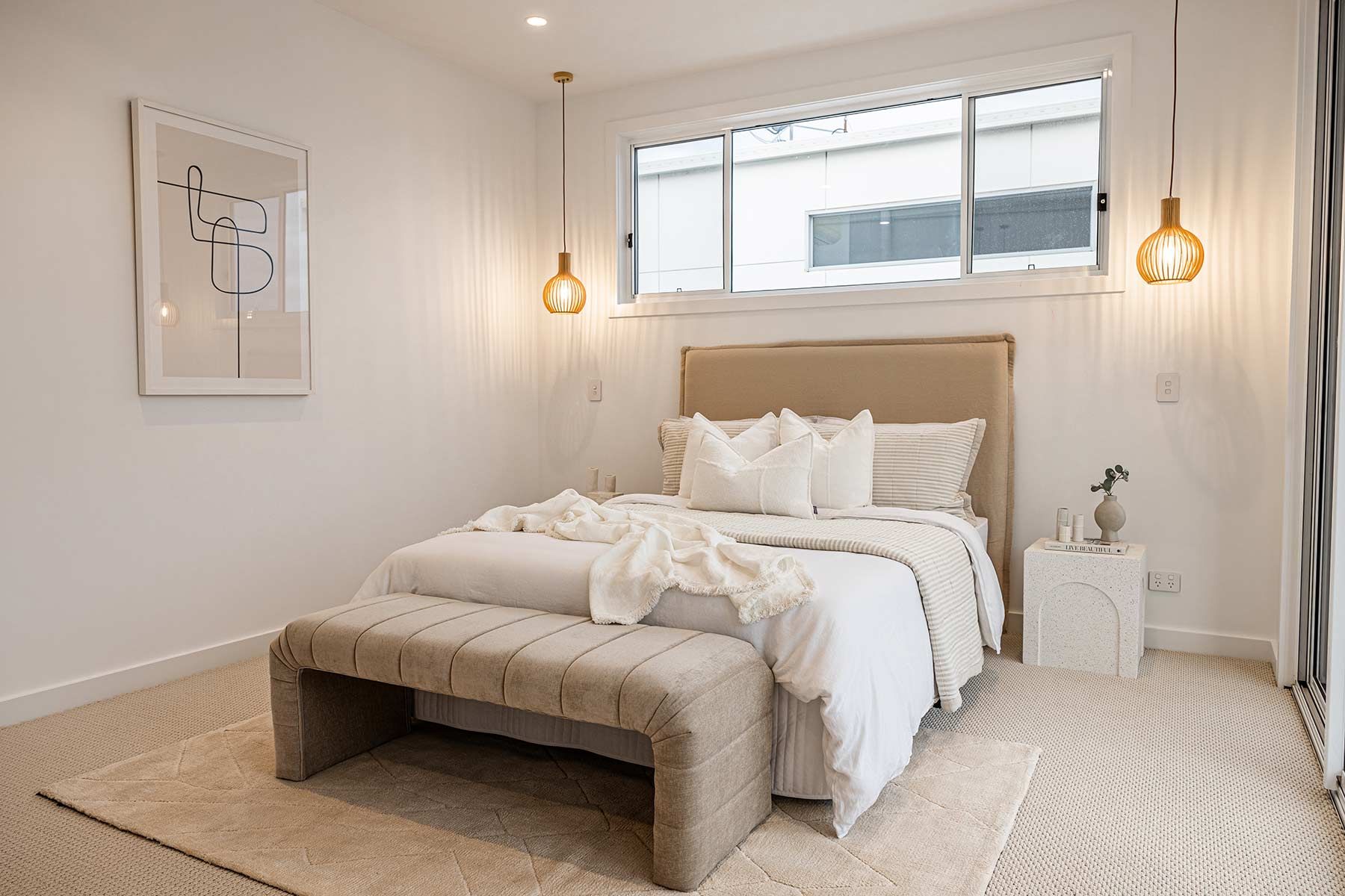 Bedroom With a Bed a Small Bedside Table — JMB Electrical Services In Port Kembla, NSW