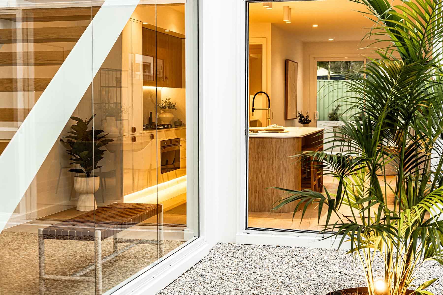 A House With a Bench and Plants — JMB Electrical Services In Port Kembla, NSW