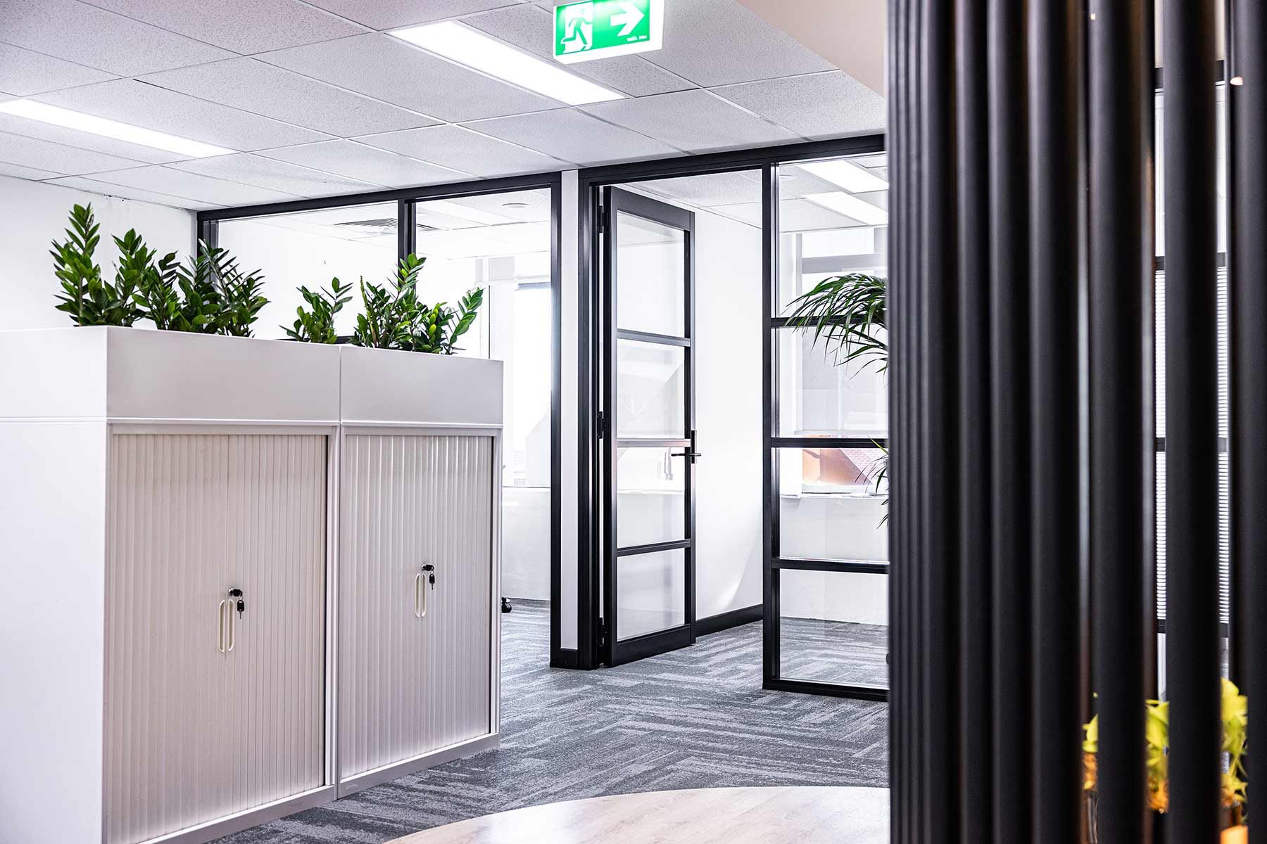 Office Interior With Glass Doors — JMB Electrical Services In Port Kembla, NSW