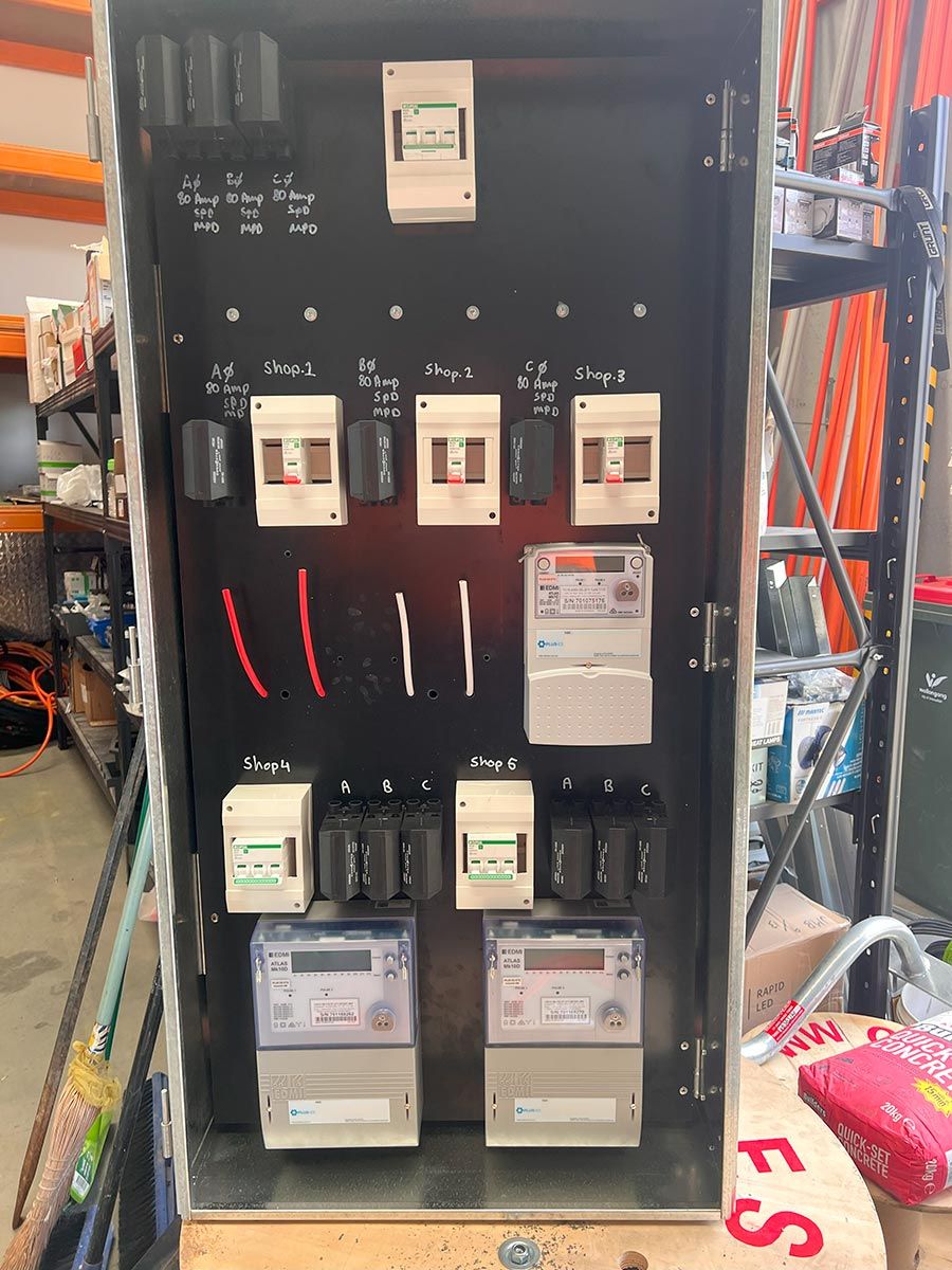 Electrical Panel With Labeled Switches and Meters — JMB Electrical Services In Port Kembla, NSW