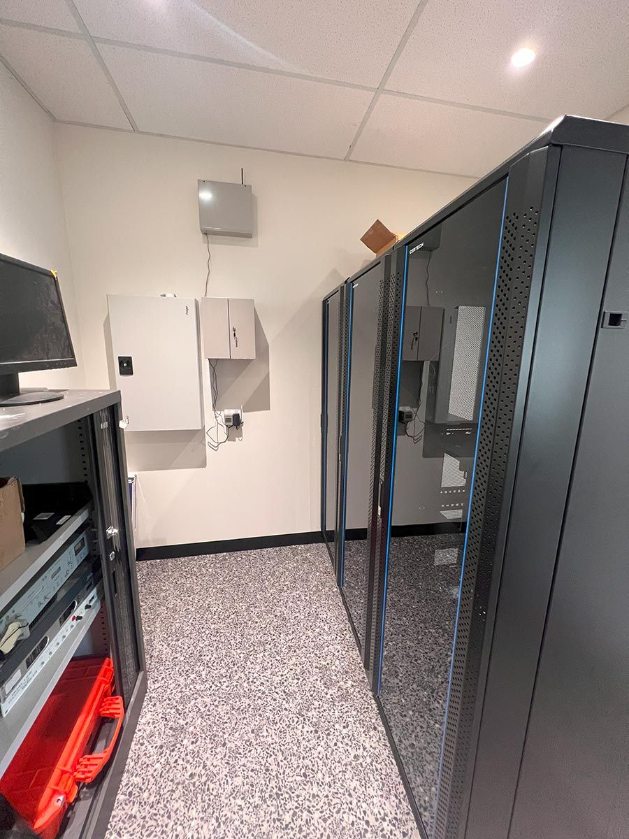 Modern Server Room With Black Cabinets — JMB Electrical Services In Port Kembla, NSW