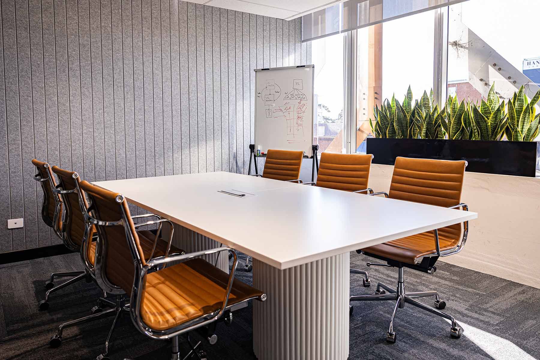 A Conference Room With Leather Chairs — JMB Electrical Services In Port Kembla, NSW