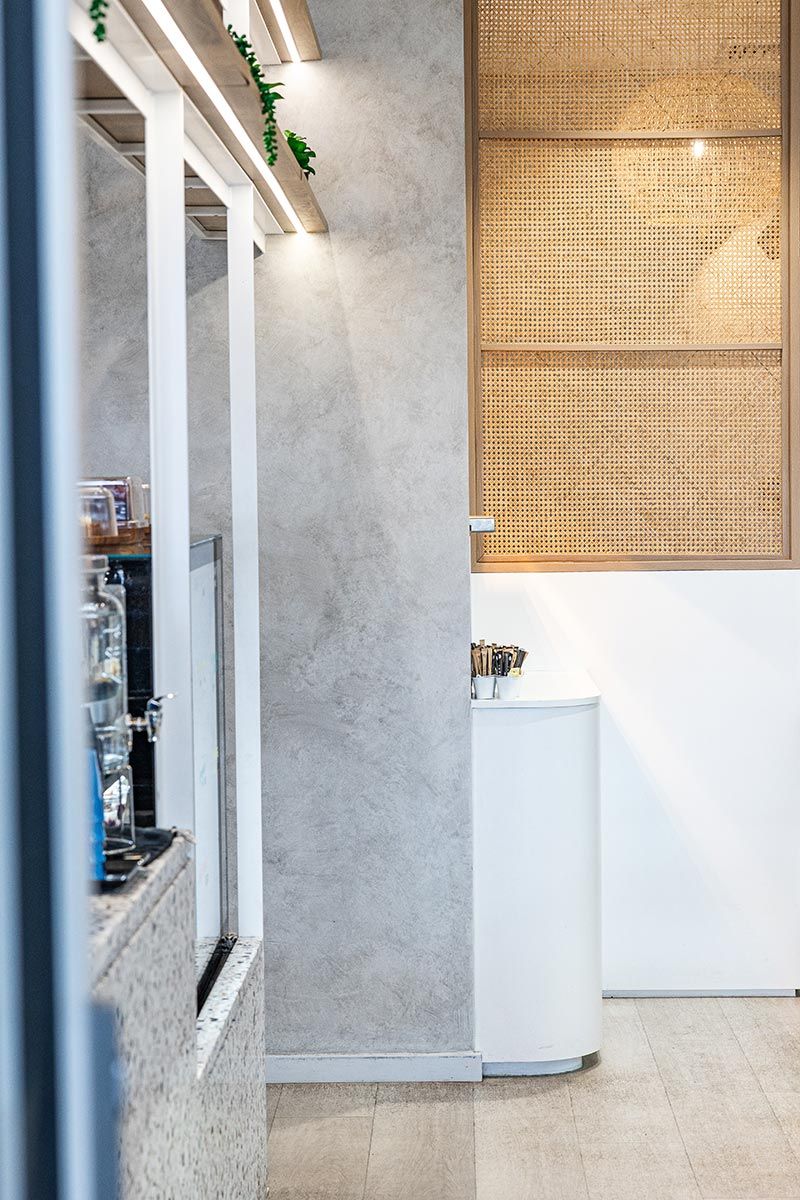 Cafe Interior Featuring a Textured Grey Wall — JMB Electrical Services In Port Kembla, NSW