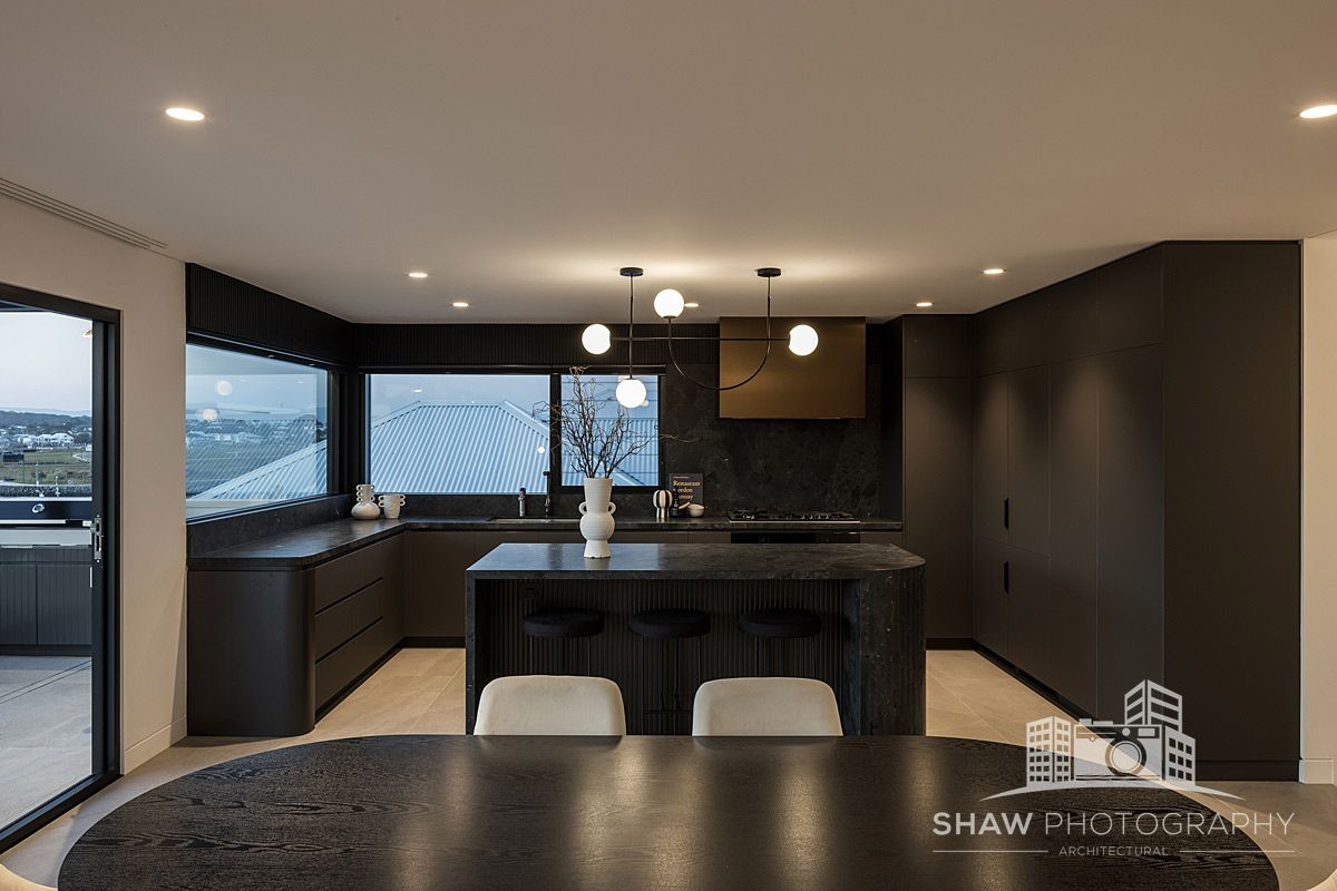 A Kitchen With a Table and Chairs — JMB Electrical Services In Port Kembla, NSW