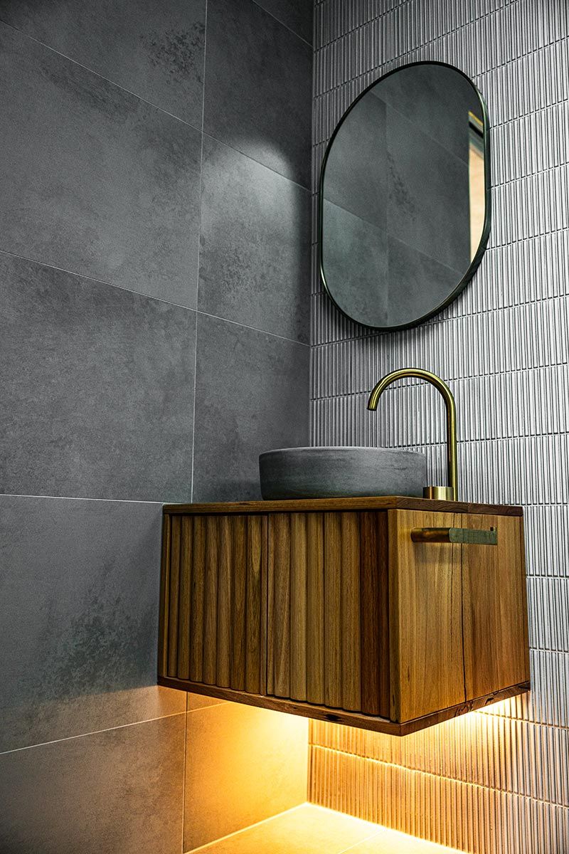 Bathroom With a Wood-textured Floating Vanity — JMB Electrical Services In Port Kembla, NSW