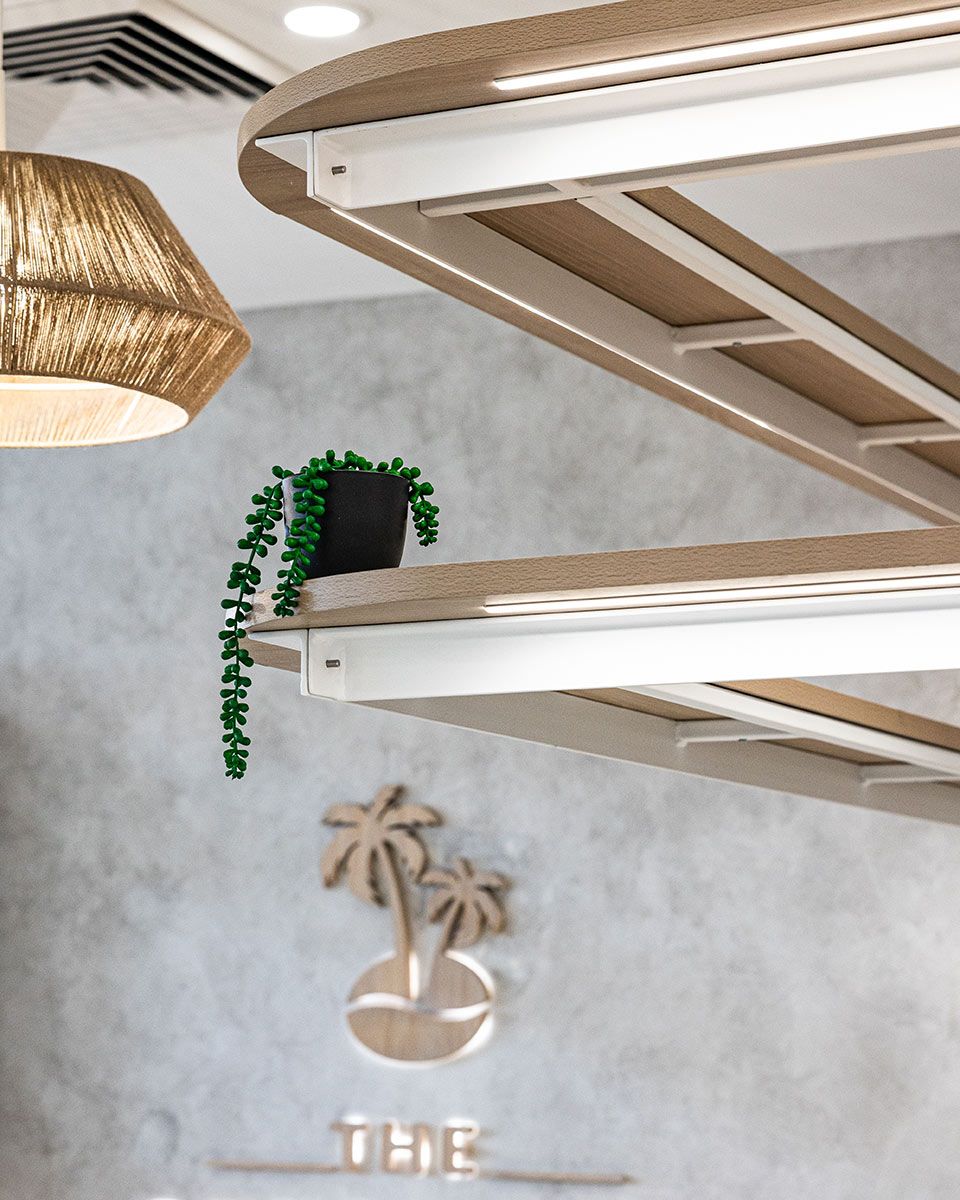 The Wall Features a Subtle Palm Tree Design — JMB Electrical Services In Port Kembla, NSW