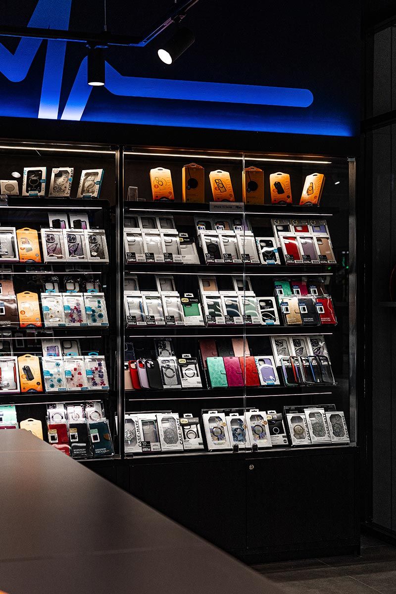 A Display of Phone Cases With Various Designs — JMB Electrical Services In Port Kembla, NSW