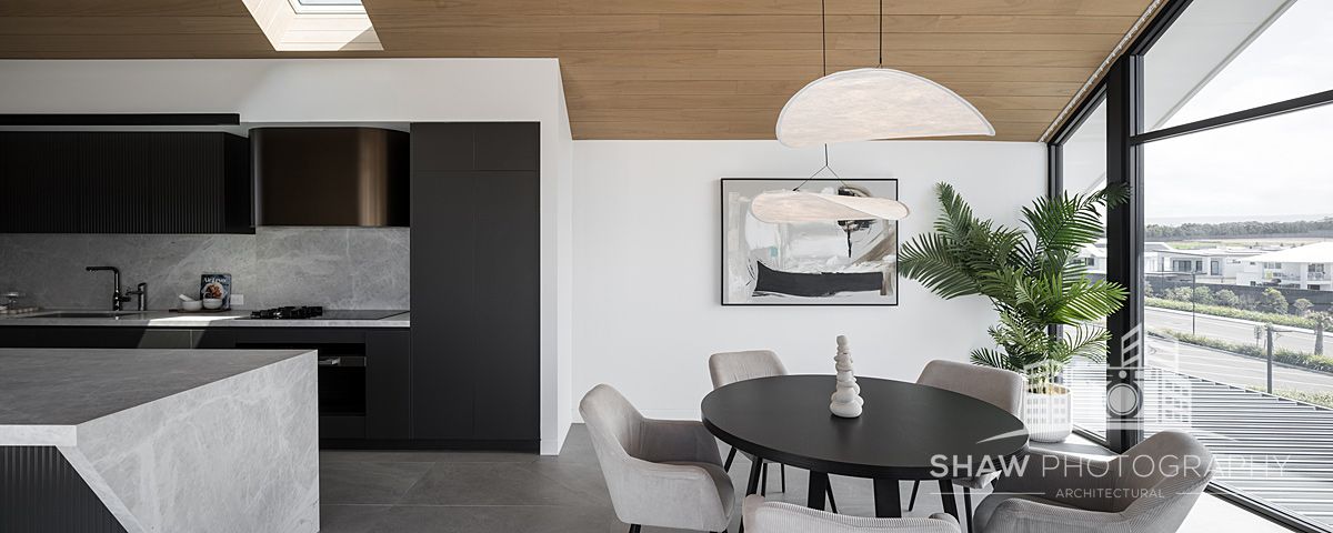 A Room With a Round Table and Chairs — JMB Electrical Services In Port Kembla, NSW