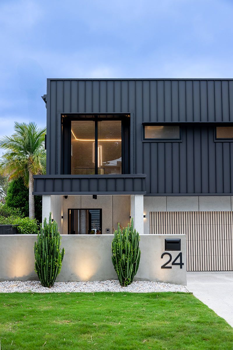 House With Dark Cladding and Large Windows — JMB Electrical Services In Port Kembla, NSW
