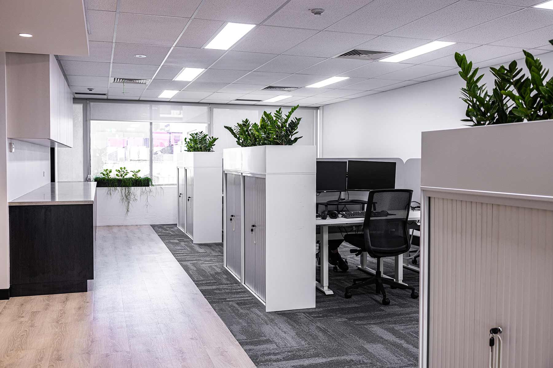 Office Space With White Desks and Black Chairs — JMB Electrical Services In Port Kembla, NSW