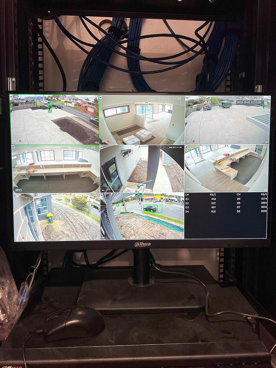 A Security Monitor Displays Eight Surveillance Camera — JMB Electrical Services In Port Kembla, NSW