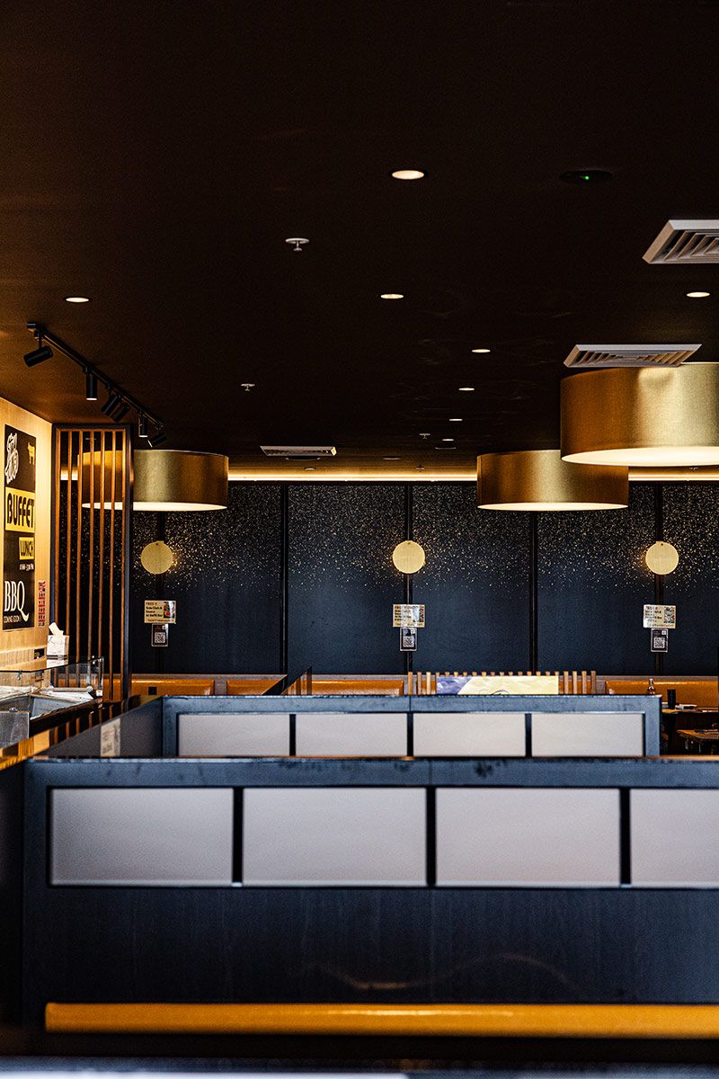 Restaurant Interior With Black and Gold Decor — JMB Electrical Services In Port Kembla, NSW