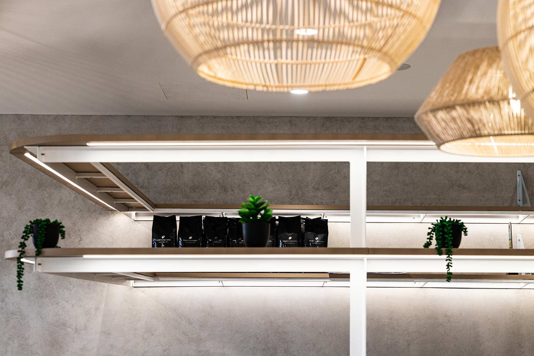 Wooden Shelves Featuring Small Potted Plants — JMB Electrical Services In Port Kembla, NSW