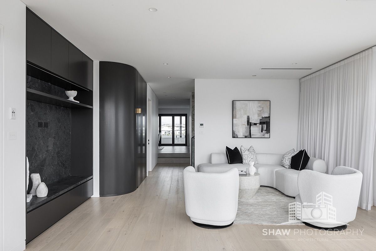 A Living Room With a Couch, Chairs, and a Table — JMB Electrical Services In Port Kembla, NSW