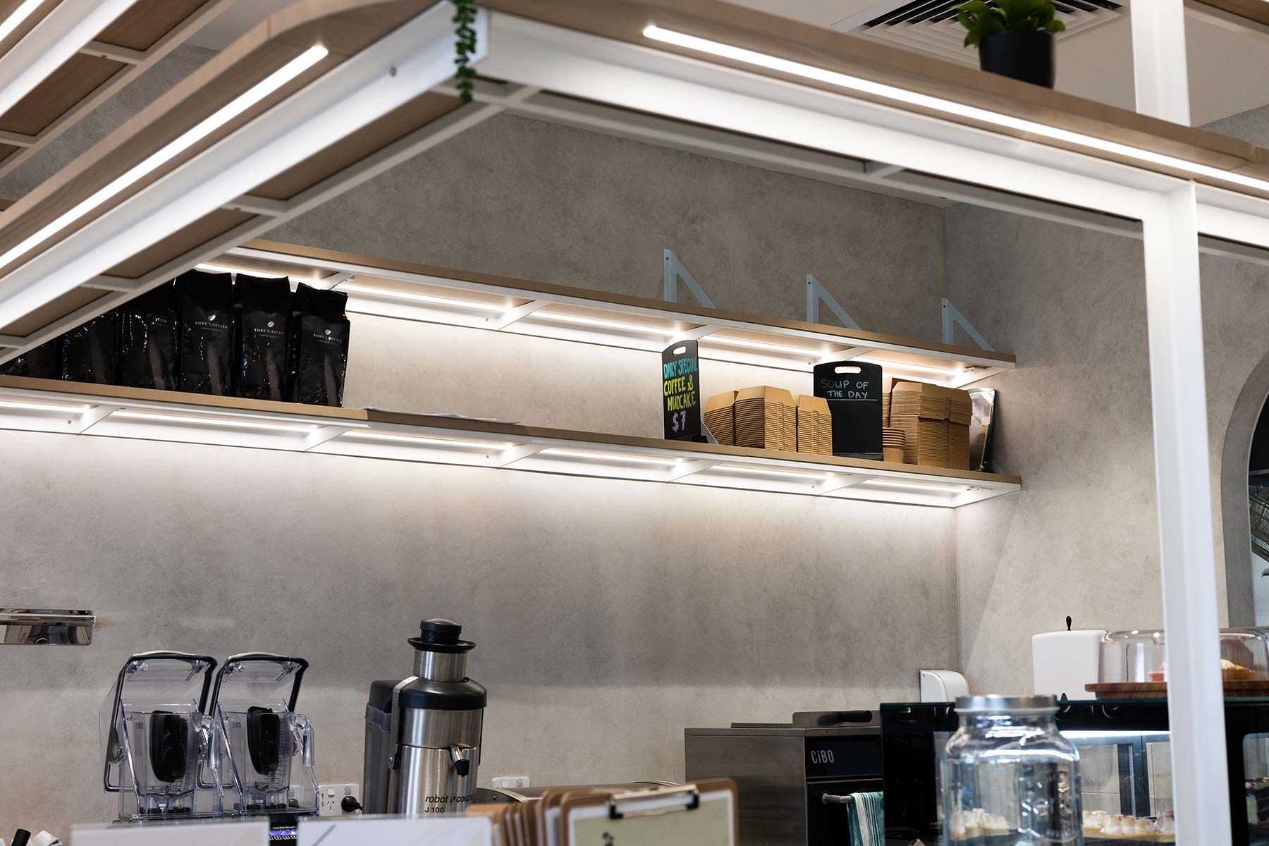 Modern Cafe Interior With Industrial Shelves — JMB Electrical Services In Port Kembla, NSW