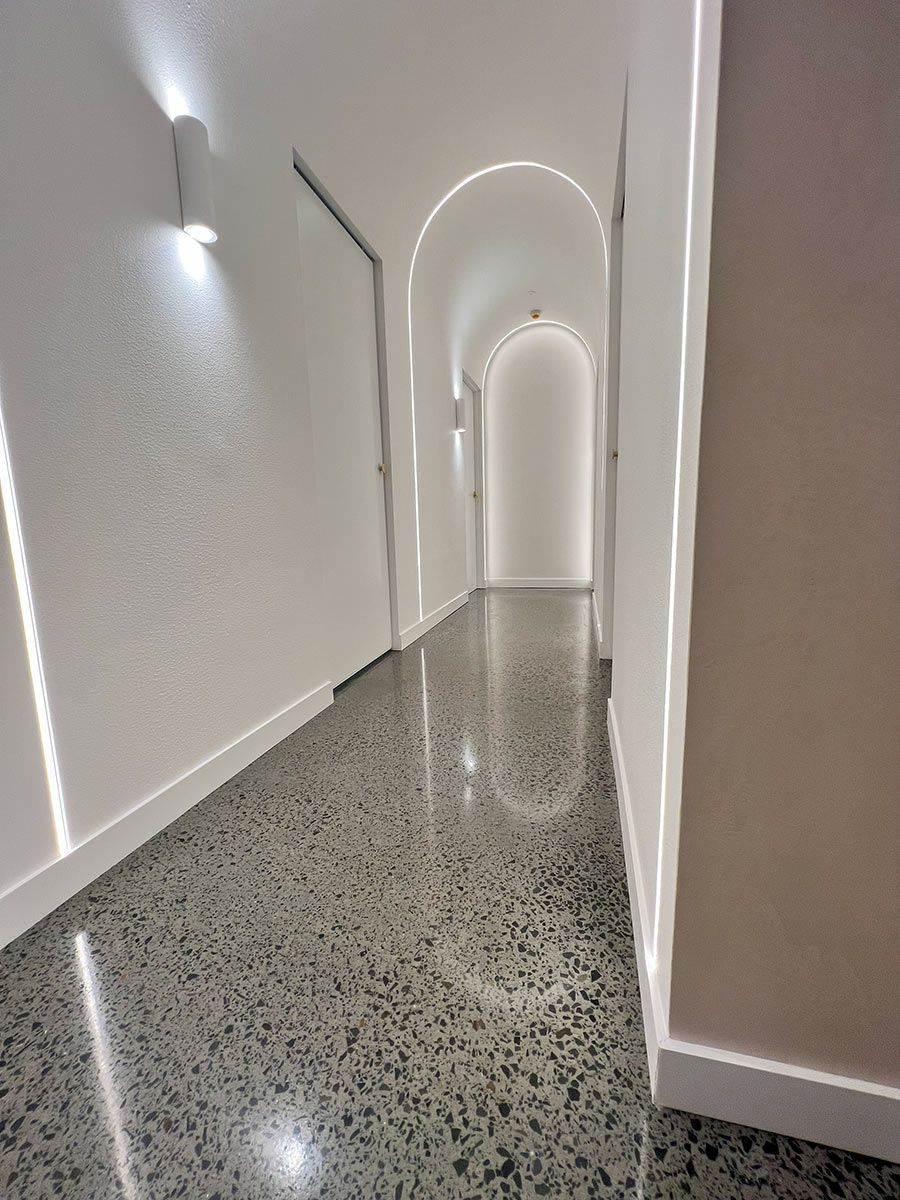 Sleek Modern Hallway With Polished Floor — JMB Electrical Services In Port Kembla, NSW