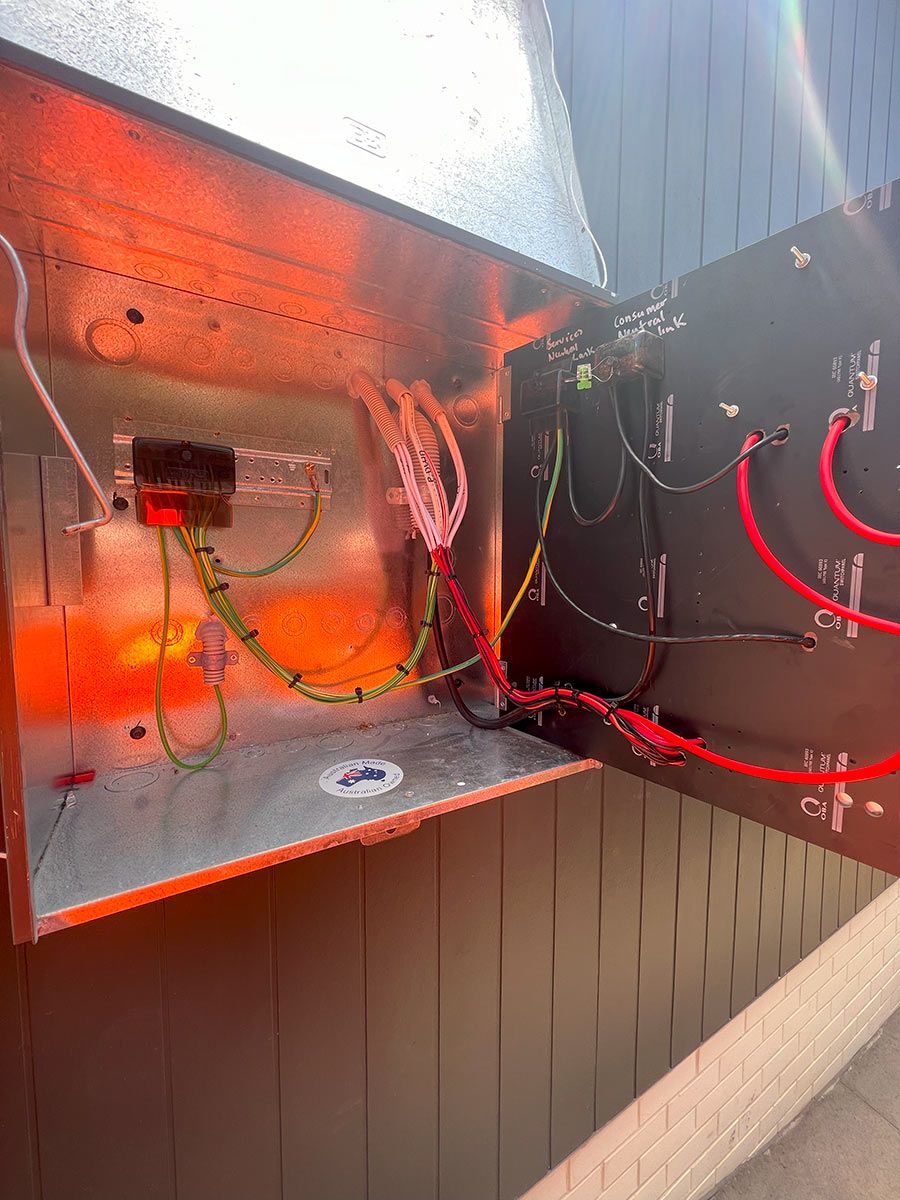 Open Electrical Panel Mounted on a Wall — JMB Electrical Services In Port Kembla, NSW