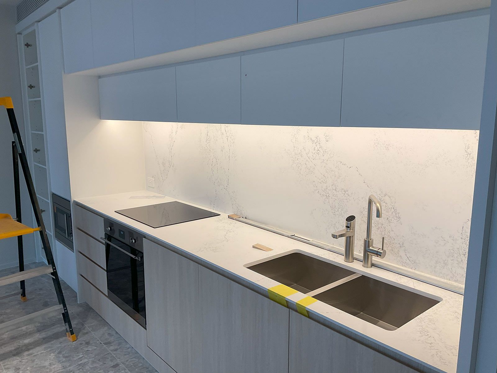Modern Kitchen With a Built-in Oven — JMB Electrical Services In Port Kembla, NSW