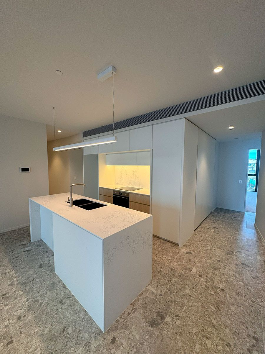 There is a Large Island in the Middle of the Kitchen — JMB Electrical Services In Port Kembla, NSW
