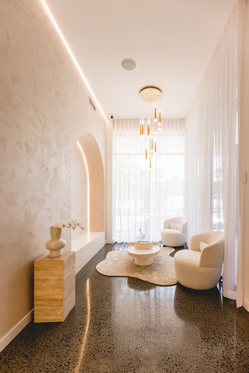 Elegant Minimalistic Room With White Chairs and a Marble Table — JMB Electrical Services In Port Kembla, NSW