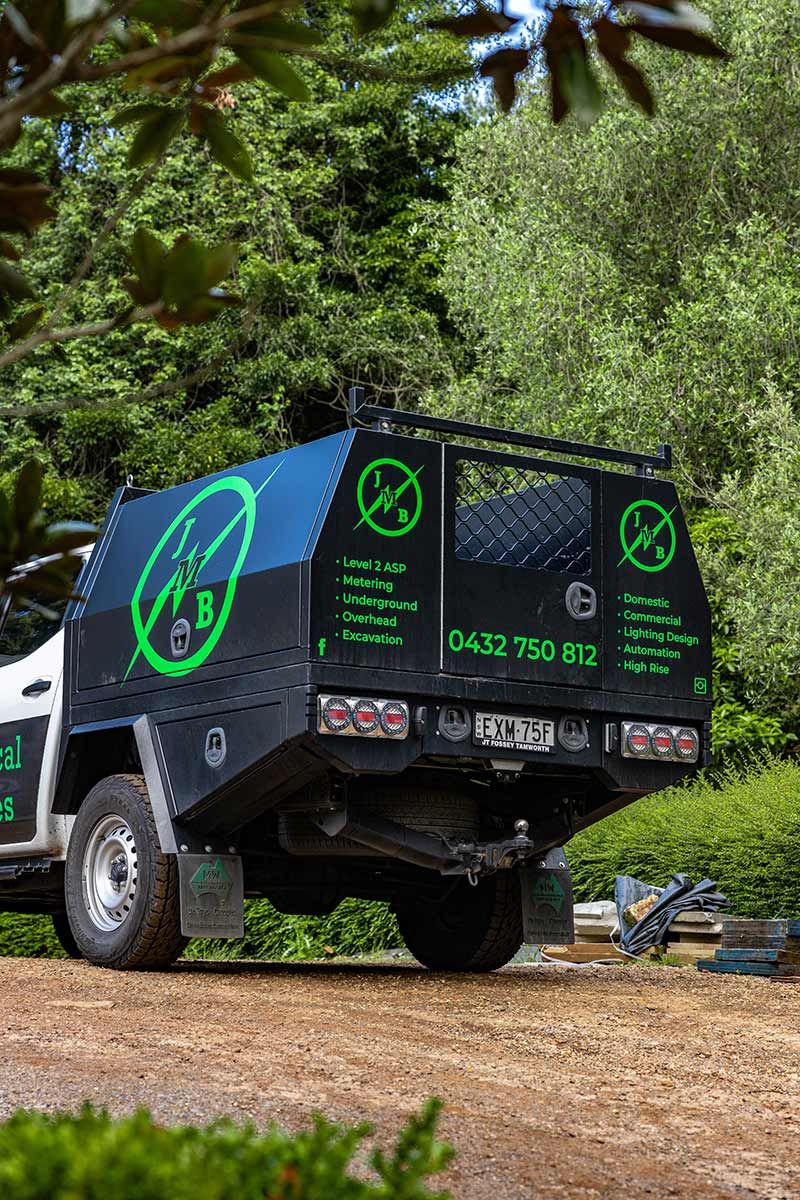 A Work Truck With Green Logo and Contact Details — JMB Electrical Services In Port Kembla, NSW