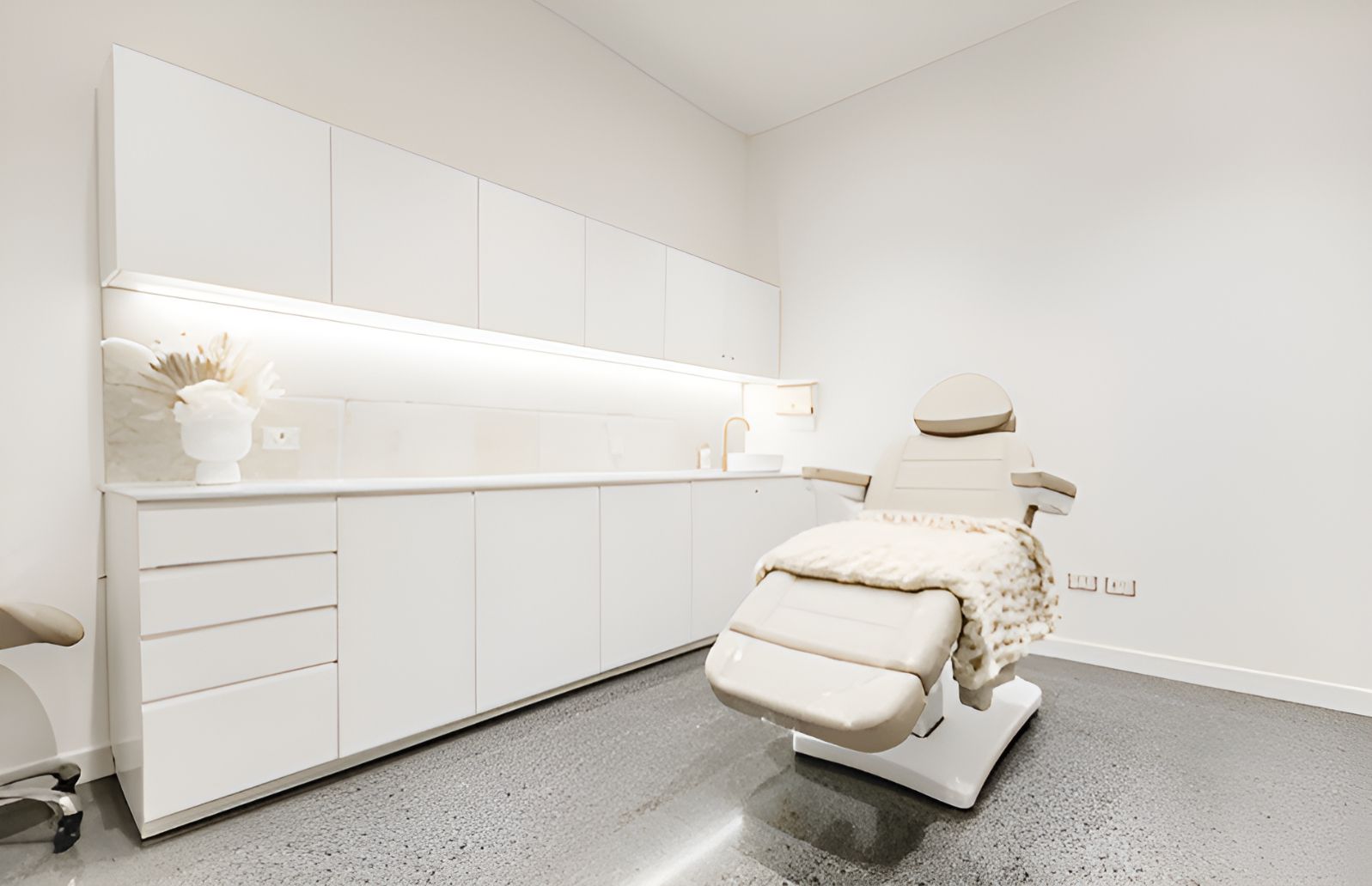 Clinic Room With a Beige Treatment Chair — JMB Electrical Services In Port Kembla, NSW