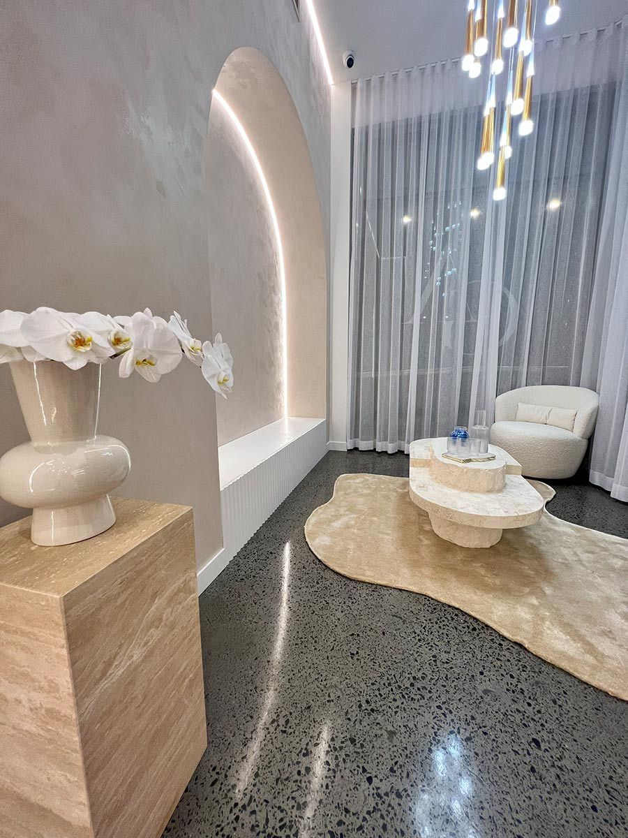 A Room With a Cozy White Chair — JMB Electrical Services In Port Kembla, NSW