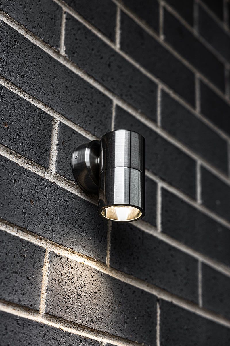 A brick wall with a light on it — JMB Electrical Services In Port Kembla, NSW