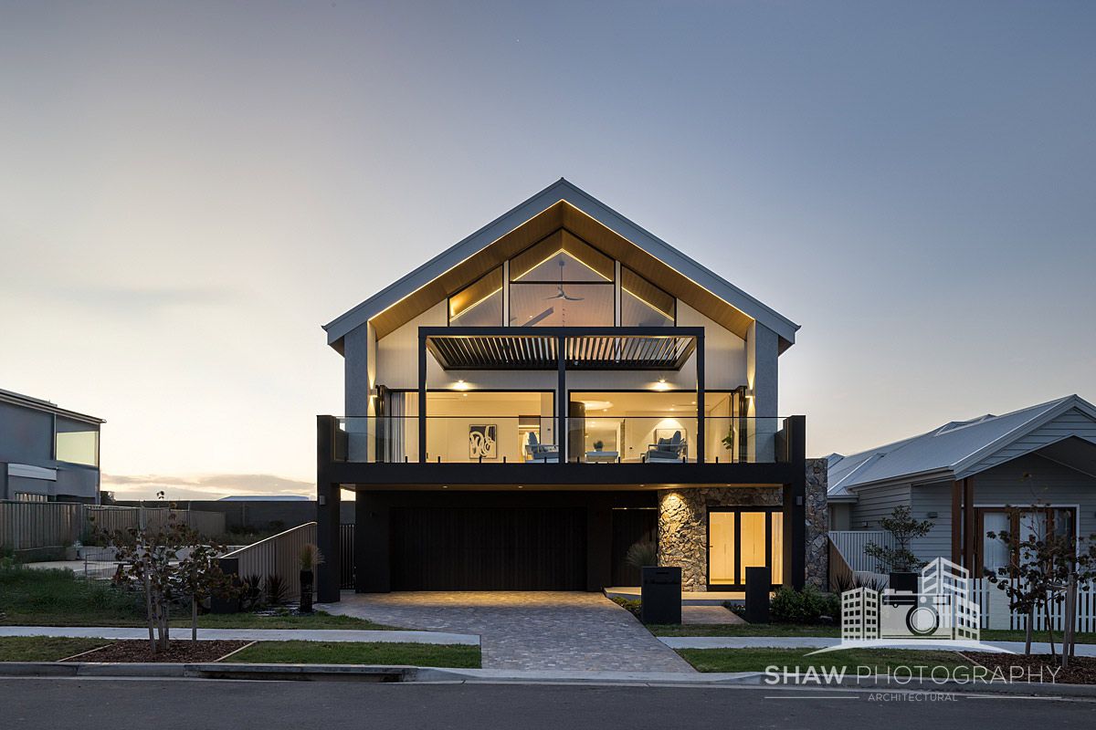 A Large House With a Lot of Windows — JMB Electrical Services In Port Kembla, NSW