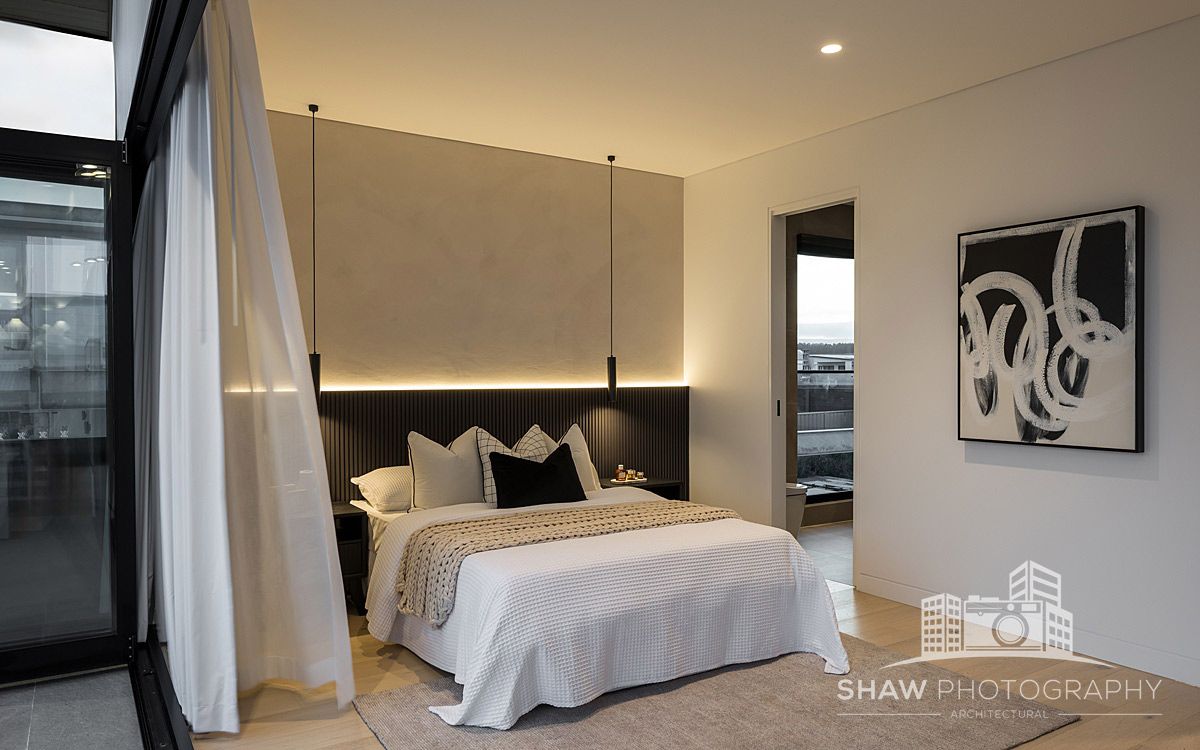 A Bedroom With a Large Bed — JMB Electrical Services In Port Kembla, NSW