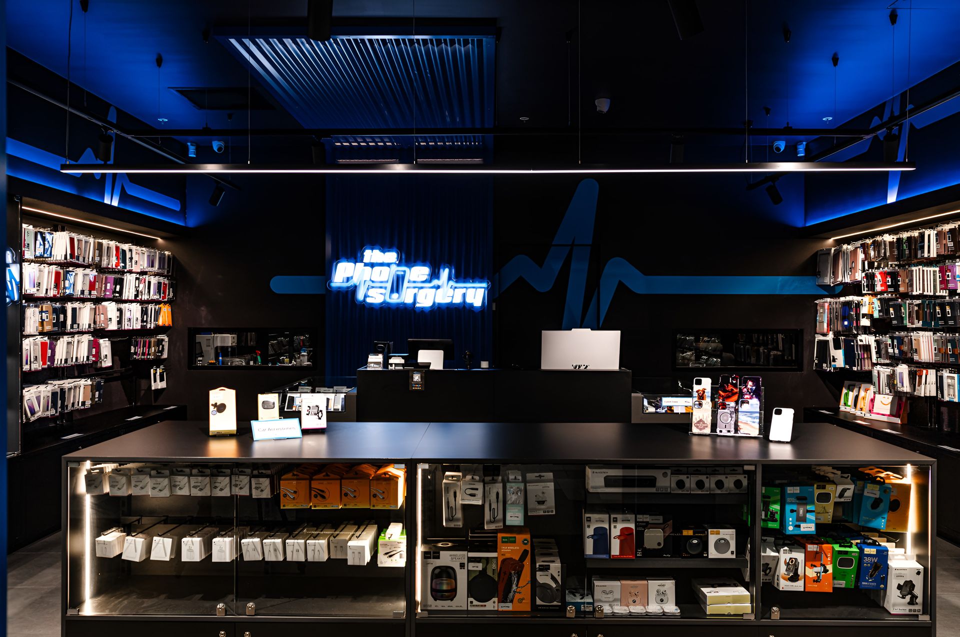 Phone Store Interior With Blue Accent Lighting — JMB Electrical Services In Port Kembla, NSW