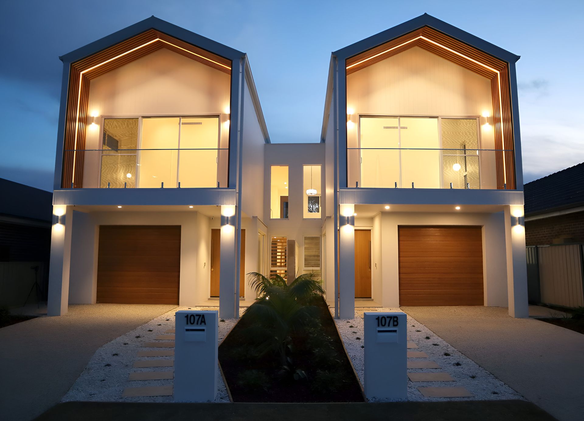Modern Duplex at Dusk — JMB Electrical Services In Port Kembla, NSW