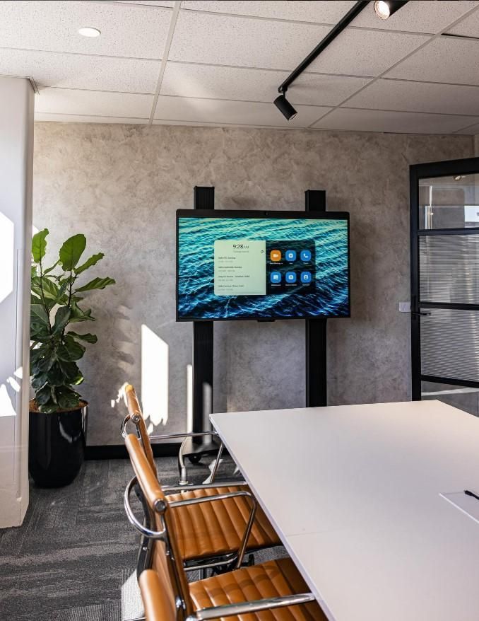 A Conference Room With a Large Flat Screen Tv on the Wall — JMB Electrical Services In Port Kembla, NSW 