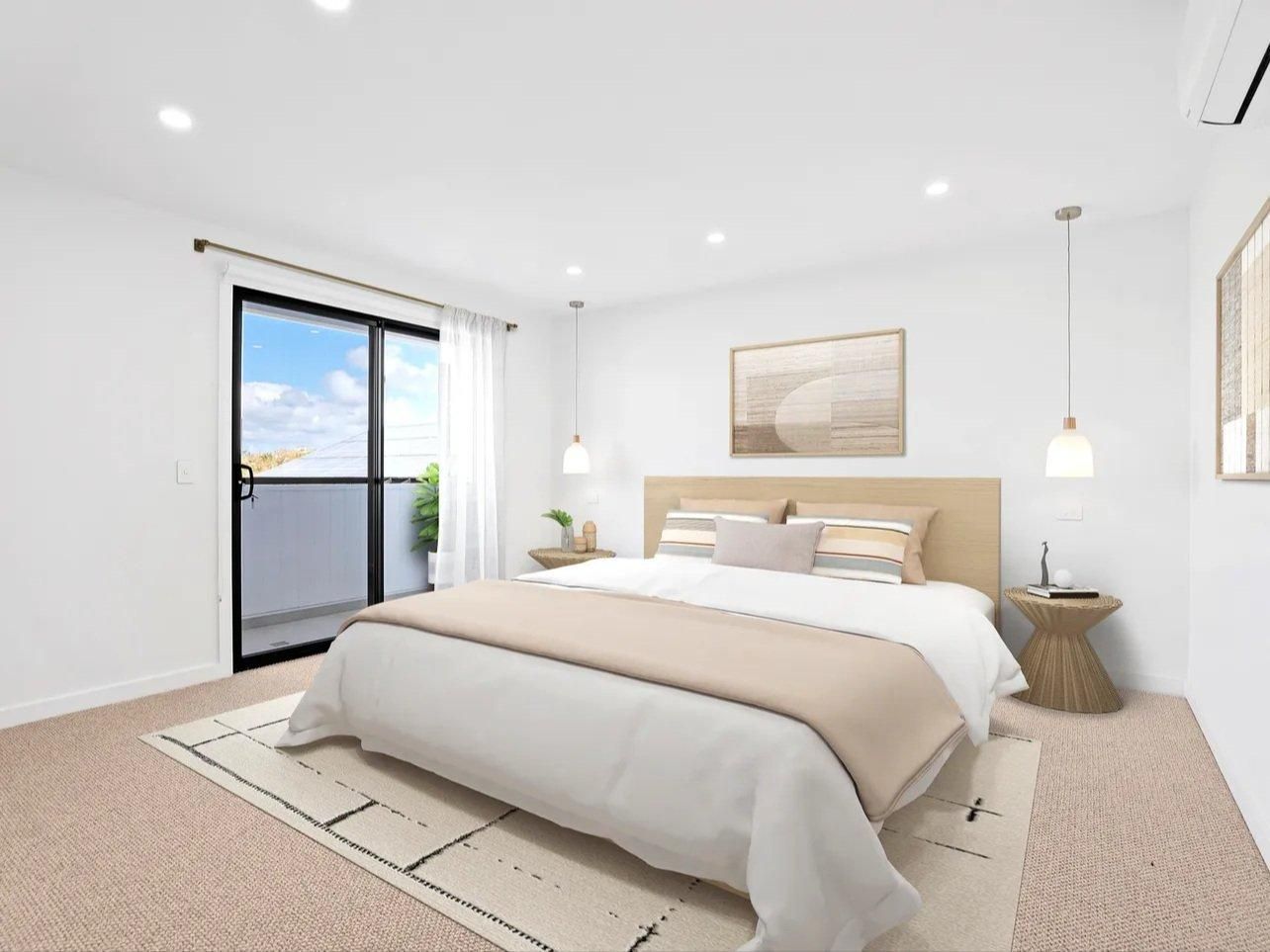 A Bedroom With a Large Bed and a Sliding Glass Door — JMB Electrical Services In Port Kembla, NSW 