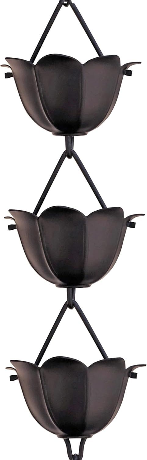 Three black hanging decorative bowls stacked vertically on a white background