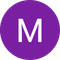 The letter m is in a purple circle on a white background.