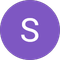 A purple circle with a white letter s inside of it.