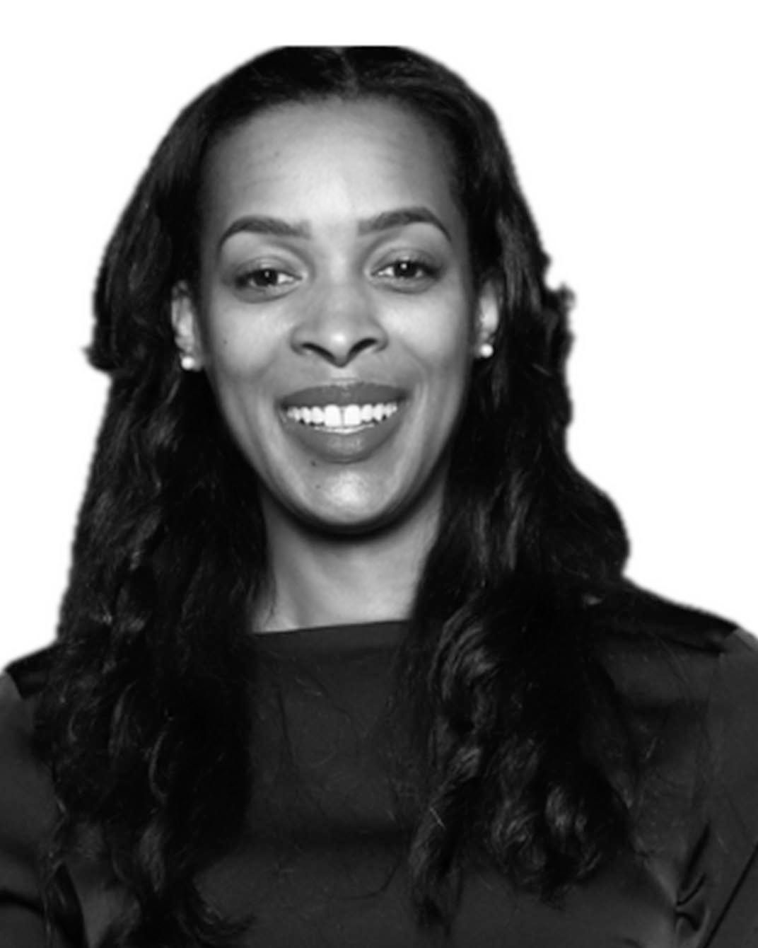 Portrait of a smiling woman with long dark hair on a plain white background