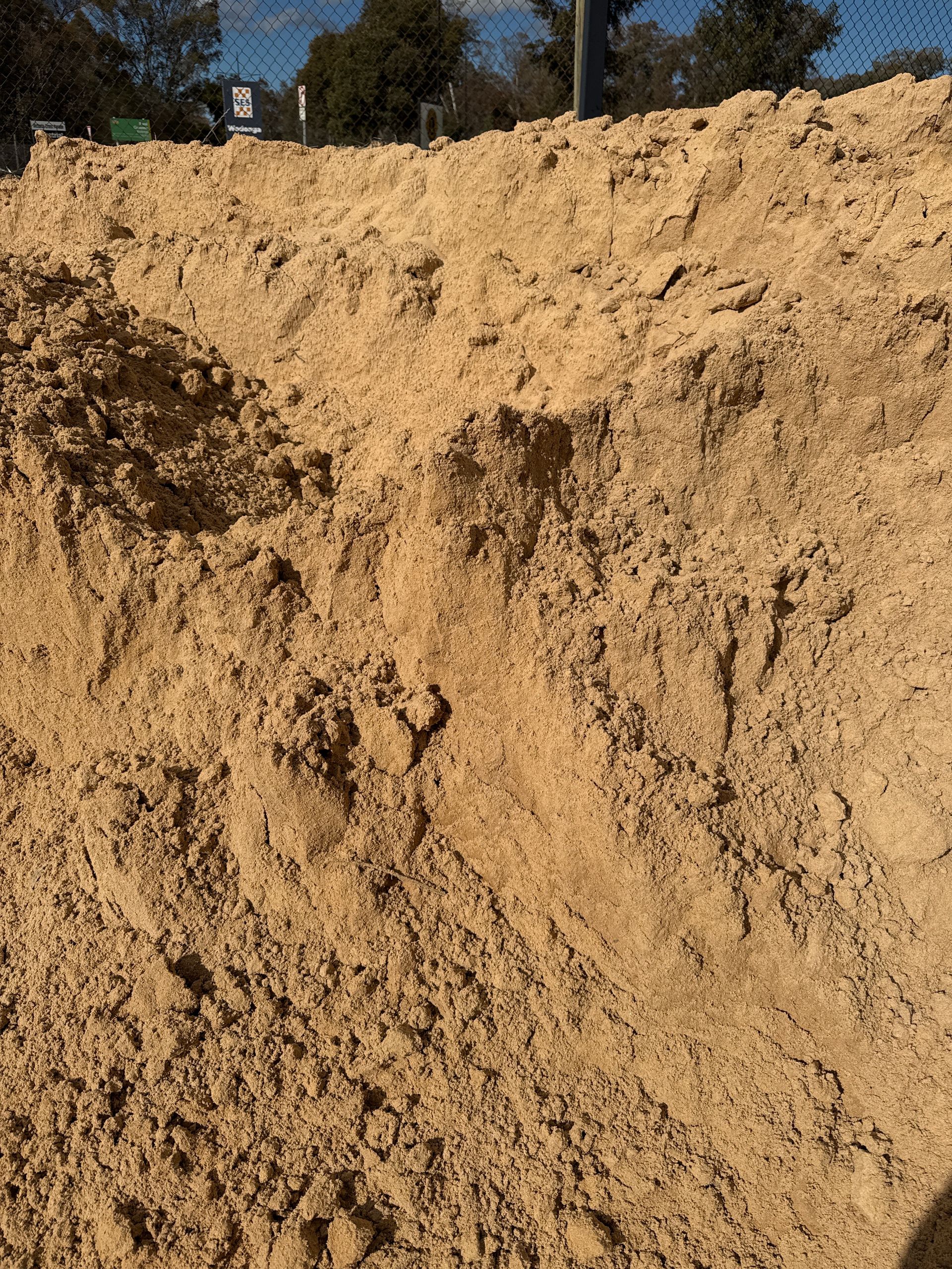 Pile Of Tan-colored Sand In An Outdoor Setting. The Sand Has A Rough, Uneven Texture — Wodonga Sand & Soil in Wodonga, VIC