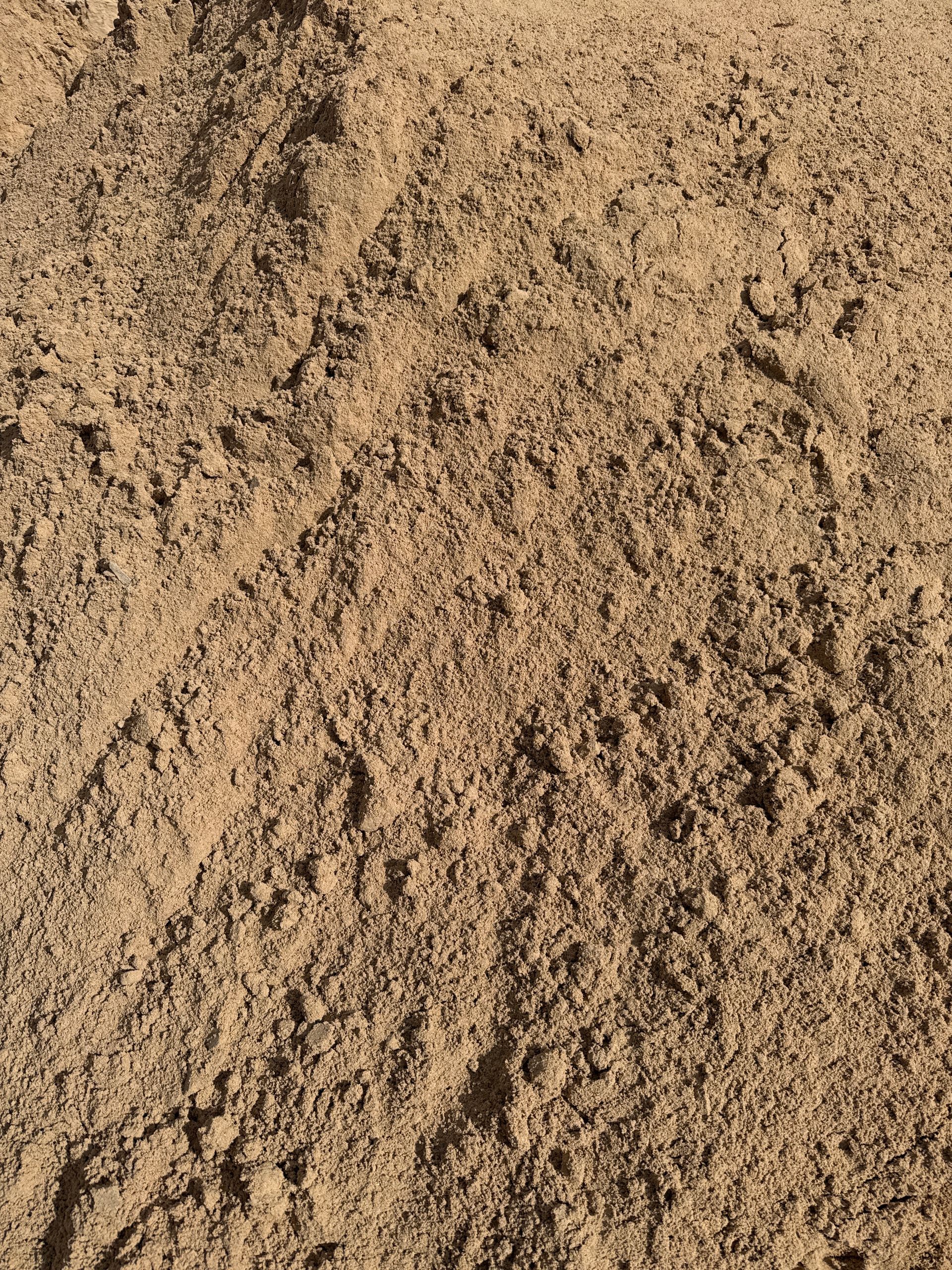 Close-up View Of Light Brown Sandy Soil, Likely Outdoors, With A Textured Surface — Wodonga Sand & Soil in Wodonga, VIC