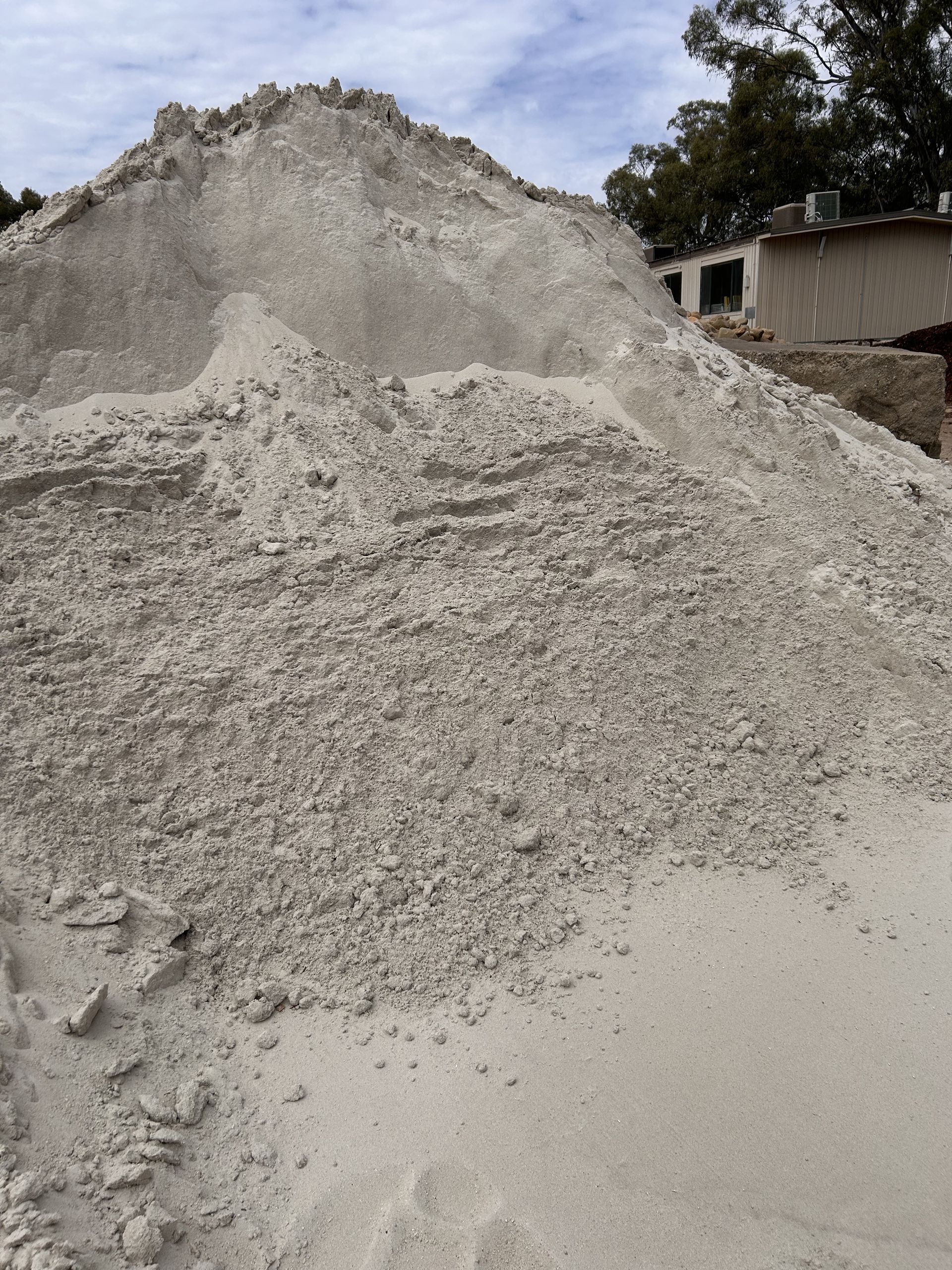 A Pile of Gravel With a Mountain in the Background — Wodonga Sand & Soil in Wodonga, VIC