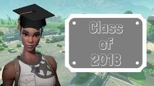A character wearing a graduation cap next to a plaque that reads