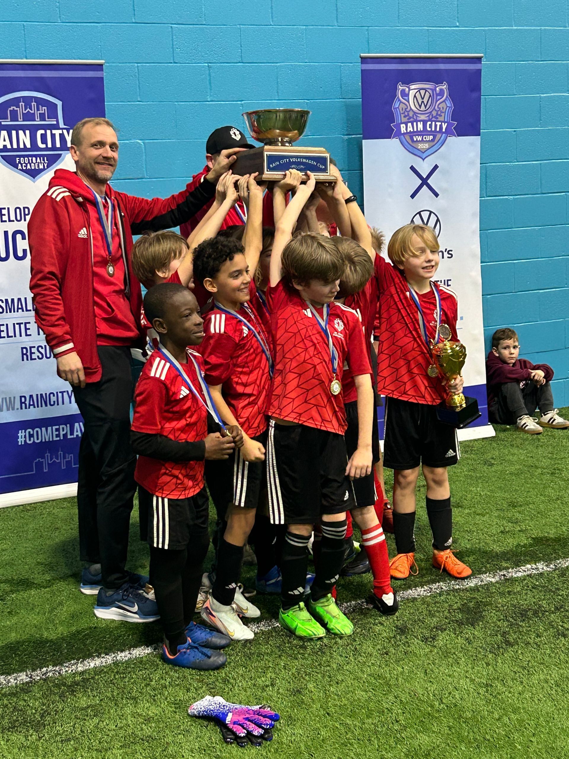 (SJS - Chaulk hoists the Rain City VW Cup)