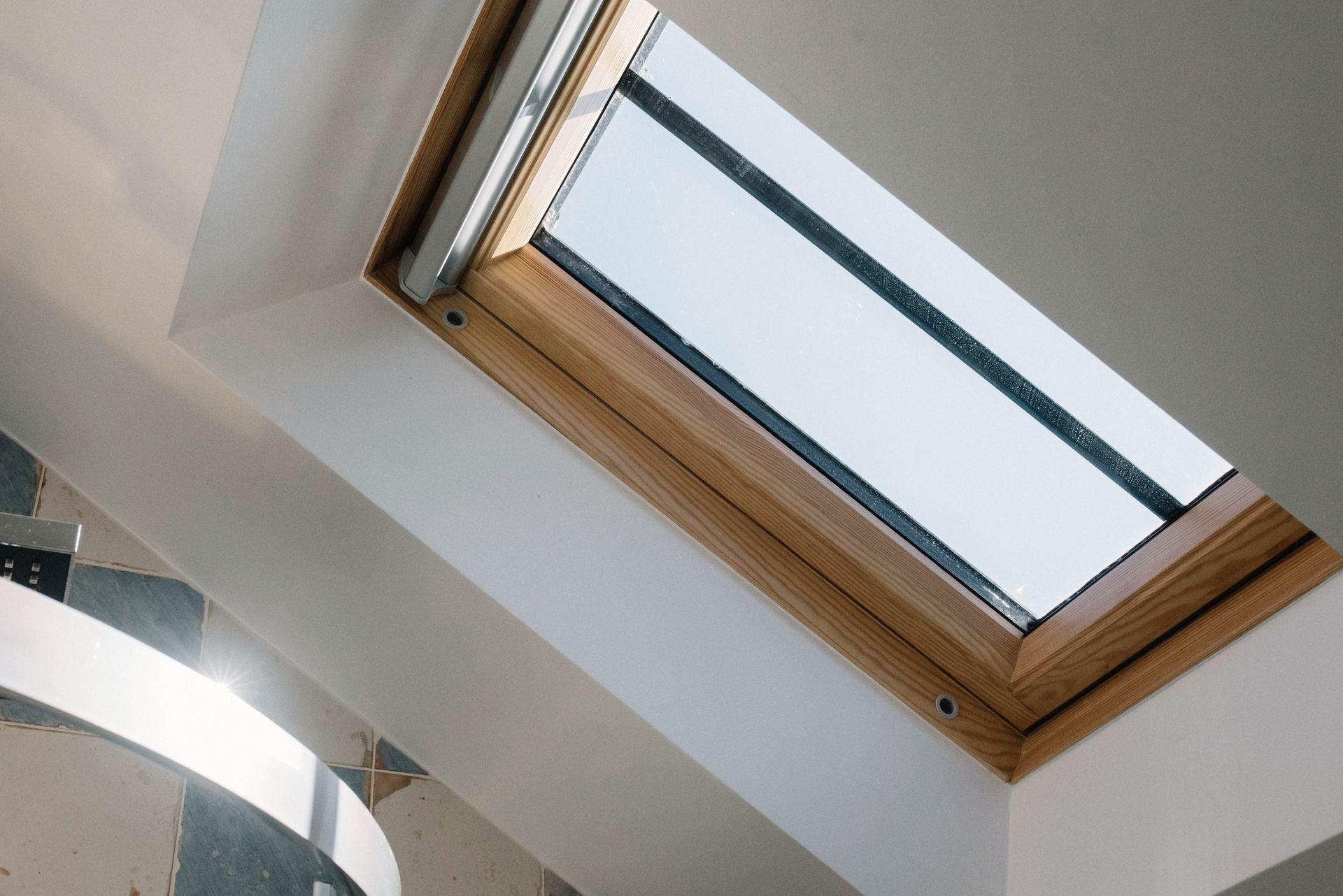 A house with a balcony and a metal railing in a Retrofit Consultancy in Tenterden