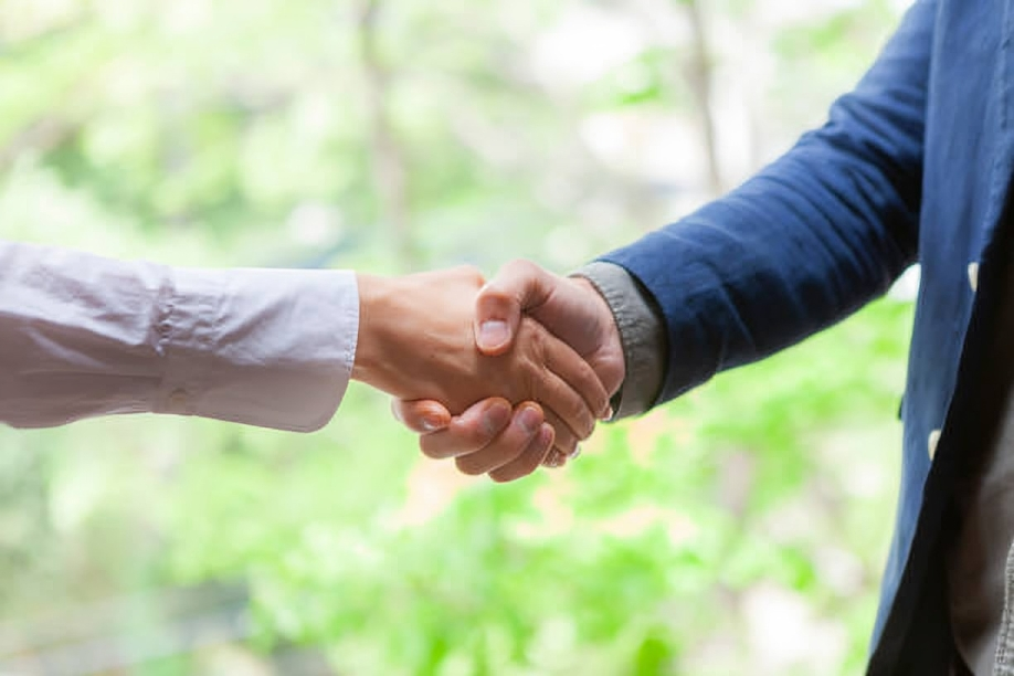 Two Men Are Shaking Hands — Marlboro, NY — Safety 360 Two Men Are Shaking Hands — Marlboro, NY — Safety 360