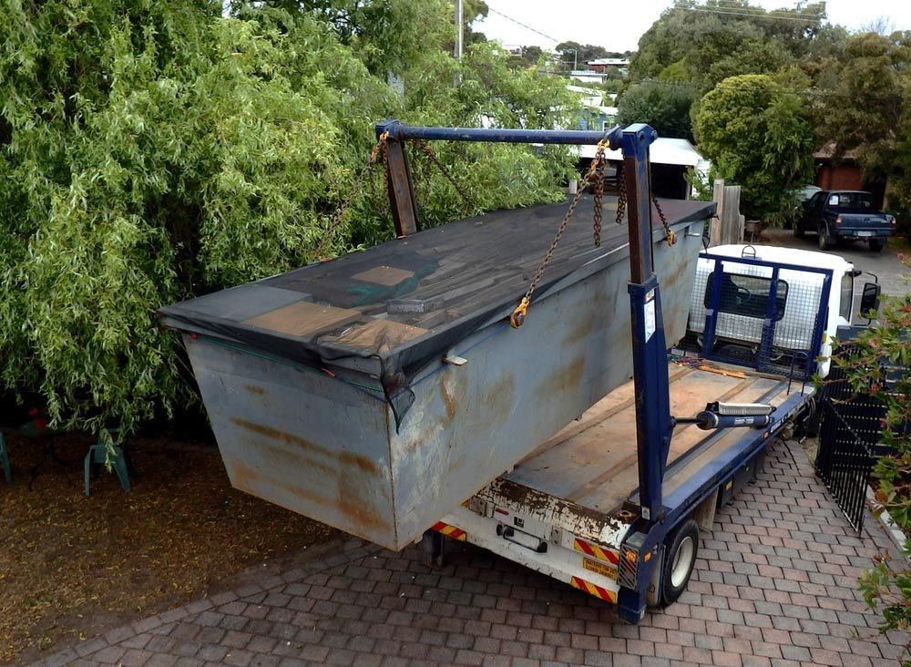 Truck Loading Waste Container — Efficient Waste Disposal in Gracemere, QLD