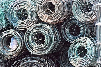 Coils of Scrap Metal in Queensland's Environmental Waste Services — Efficient Waste Disposal in Gracemere, QLD
