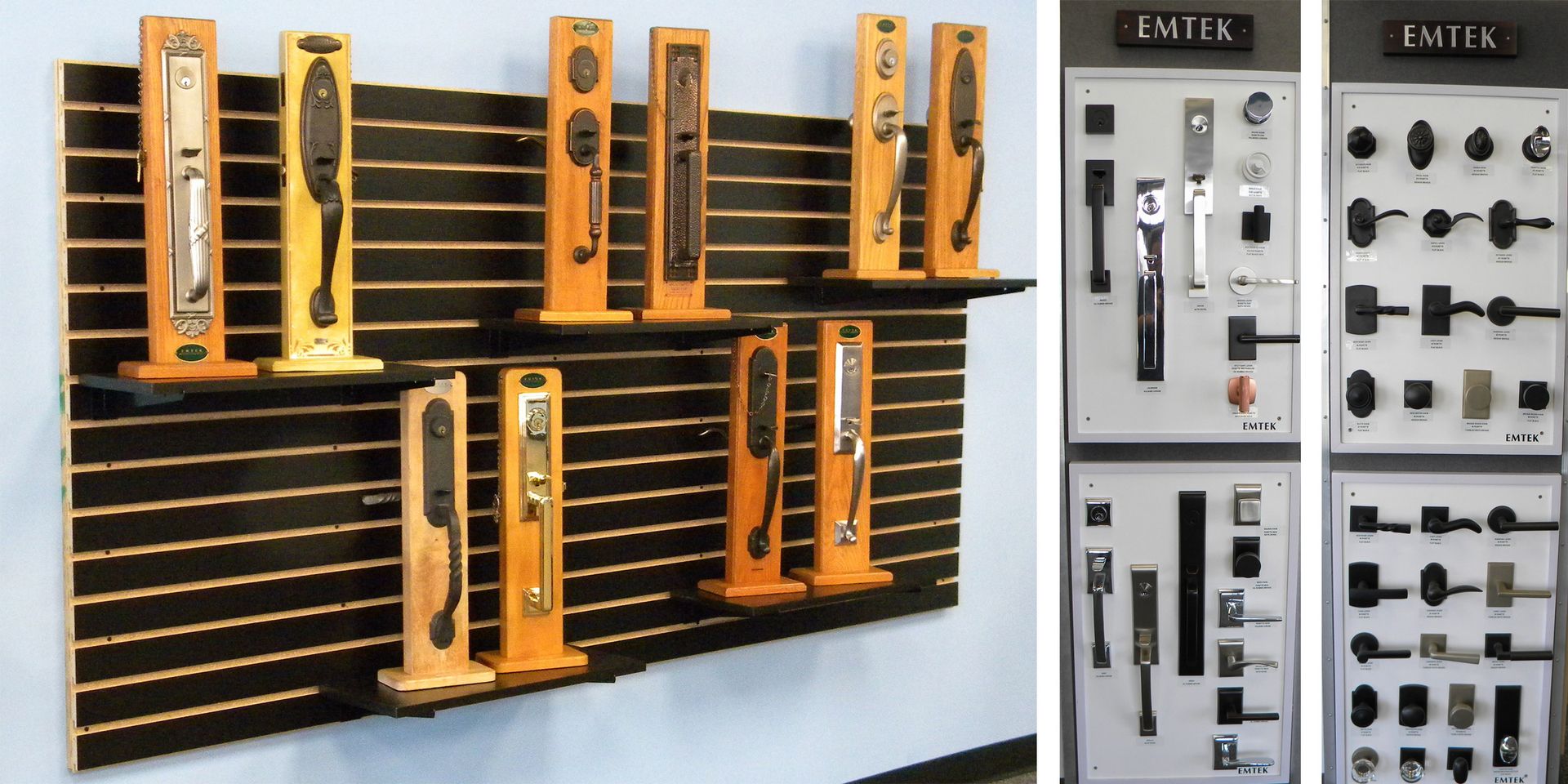 Door hardware display showing various handle sets and lock styles mounted on wooden stands and wall panels, including modern and traditional designs from Emtek.