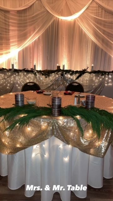 Decorated gold sequin and white table labeled