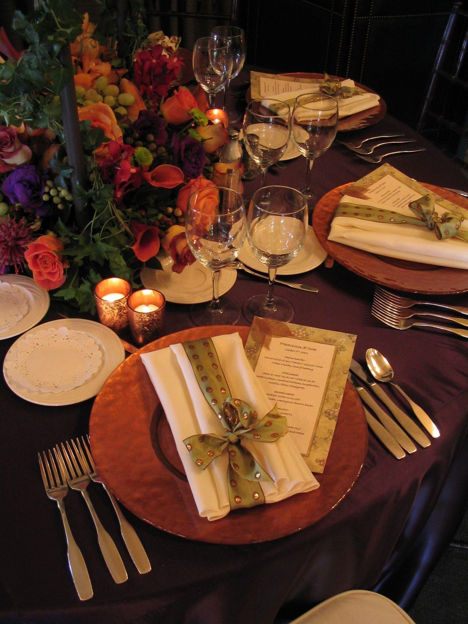 Table with menus and floral decor